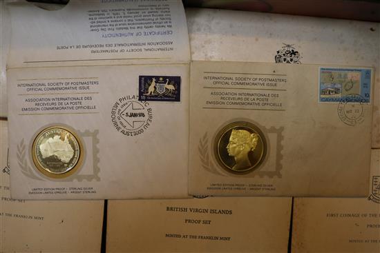 A collection of cased Franklin coin sets